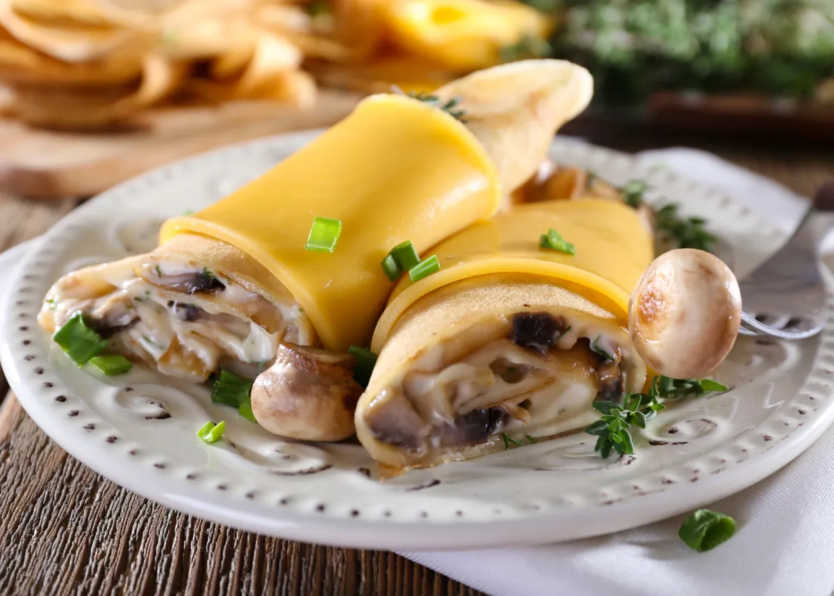 Tenerissime frittelle di latte ripiene di funghi, formaggio e noci - una vera delizia culinaria